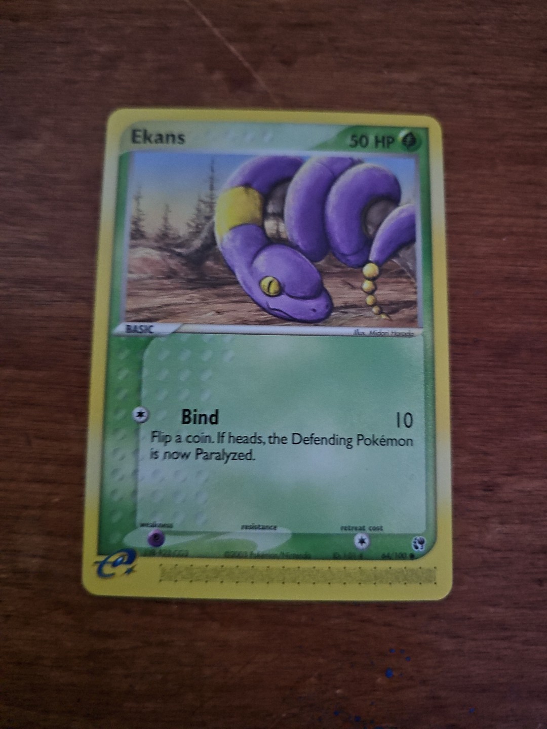 Ekans 64/100 Sandstorm Regular