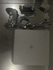 PS4 1TB with Controller Controller Charging Dock 23 Games Two Books
