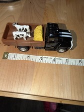 JFL Enterprises Diecast Black Farm Truck with Cows and Hay Model