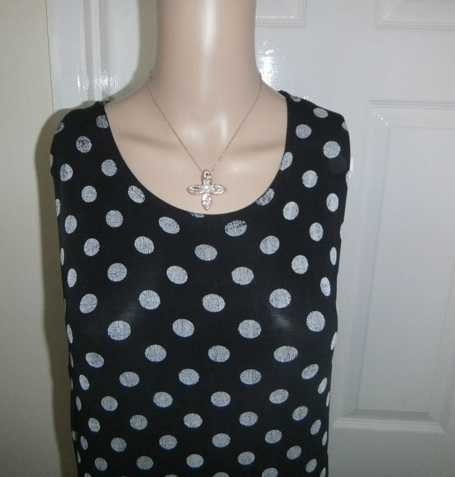 Vestido negro con lunares blancos Slinky Reino Unido Grande, usado Foto 2 de 4