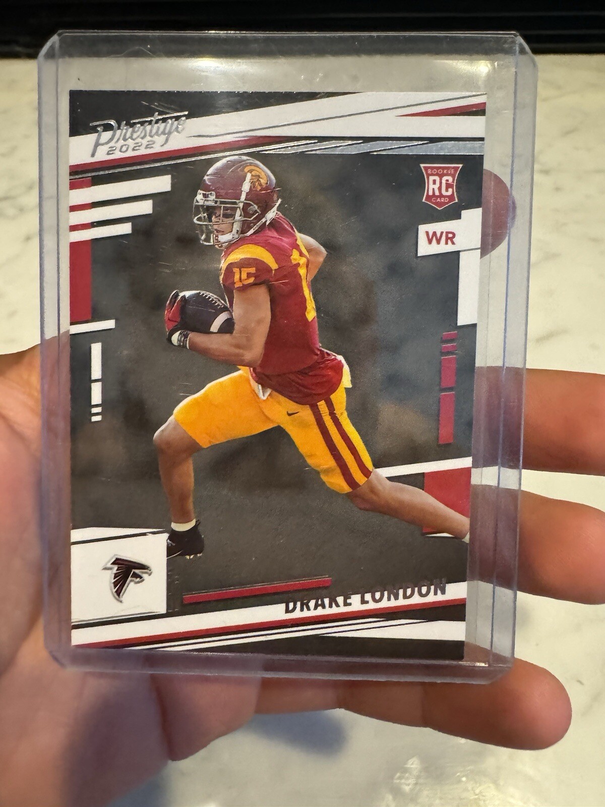 2022 Panini Prestige - Rookies Xtra Points Purple #309 Drake London /199 (RC)