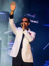 Ronnie DeVoe of New Edition performs at Joe Louis Arena during the- Old Photo 1