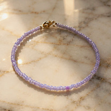 Perlenarmband lila aus Perlen, rund, mit Kara...