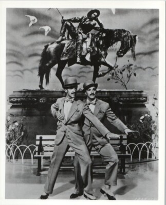 Fred Astaire and Gene Kelly singing in The Rain