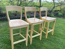Three wood breakfast bar stools with backs - John Lewis.
