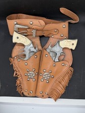 Vintage, 1950's KIT CARSON, 2TOY cap gun w/ tan holster w/fringe
