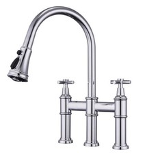 Pull-down Bridge Kitchen Faucet in chrome finish. Open box, never installed