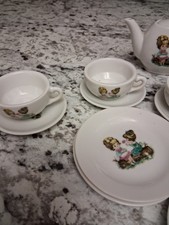 Vintage Made In Japan Tea Set Girls holding flowers Cups Saucers