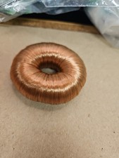 Hair Goods For Ponytail Hair Donut or Bun Maker Copper Brown Or Bronze color.