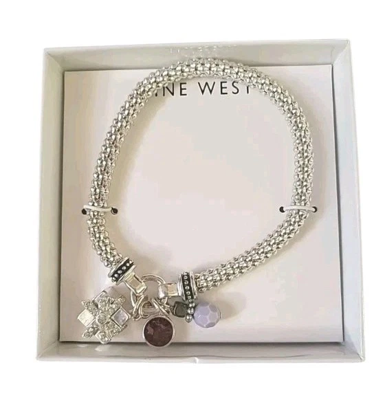 Pulsera Nine West Present Dijes con Cuentas Tono Plata Elastizada Vacaciones Nueva en Caja Foto 2 de 4