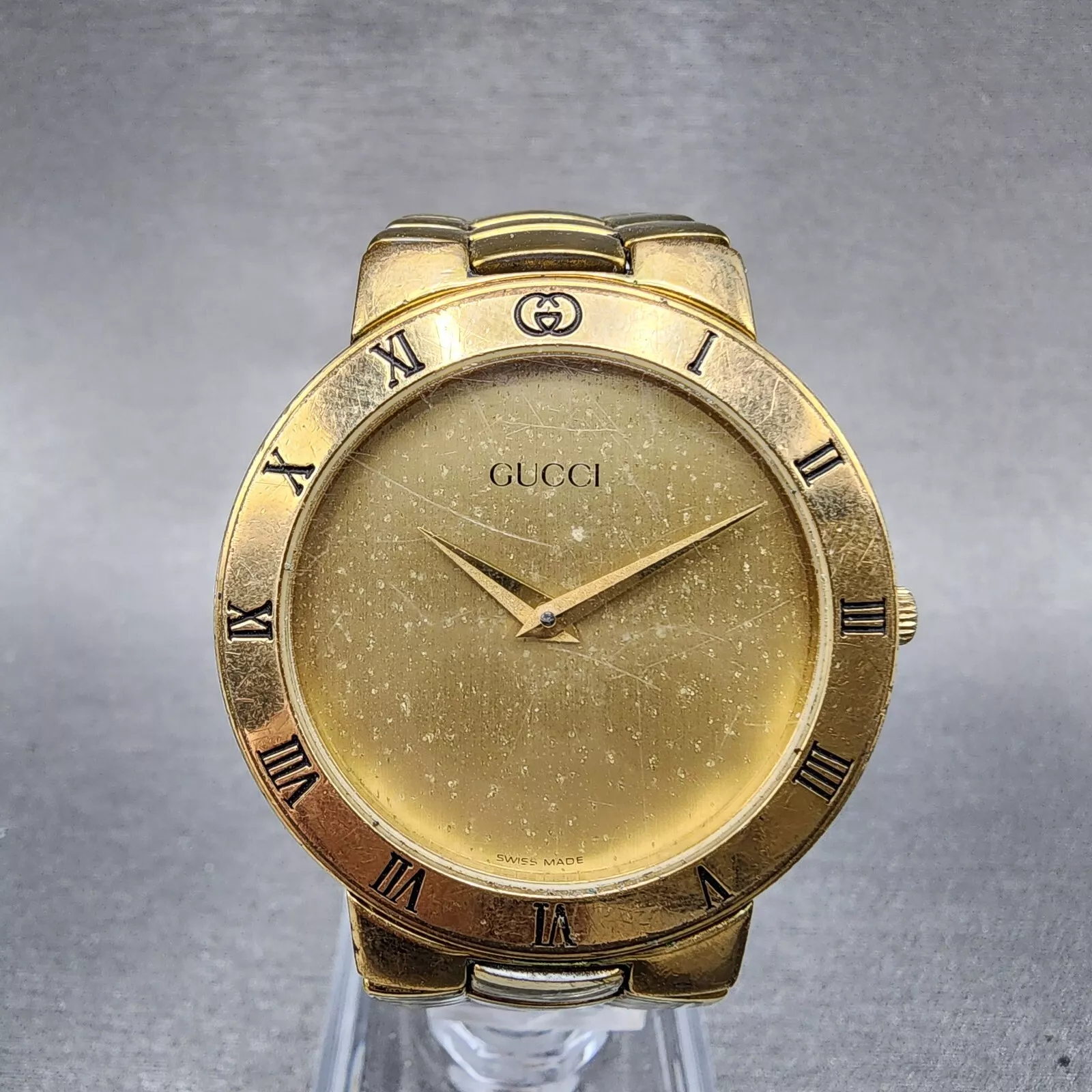 Montre Gucci 3300M homme 33 mm cadran doré ronde plaqué or pile neuve
