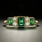 2Ct Emerald Cut Lab-Created Emerald 14K Yellow Gold Plated Engagement Band Ring