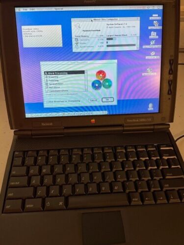 Vintage Working Apple Macintosh PowerBook 1400cs/133 CD, modem, cable, bookcover