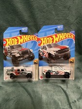 Lotto di 2 Hotwheels Chevy TrailBoss e Jeep Gladiator Zamac nello scarico Borla