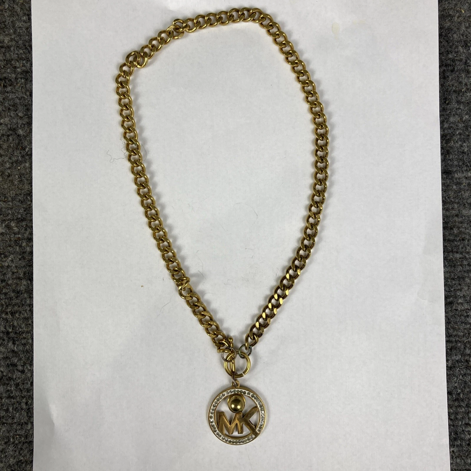 Collana MK Michael Kors tono oro diametro 1 1 4" pendente pietra con catena grossa