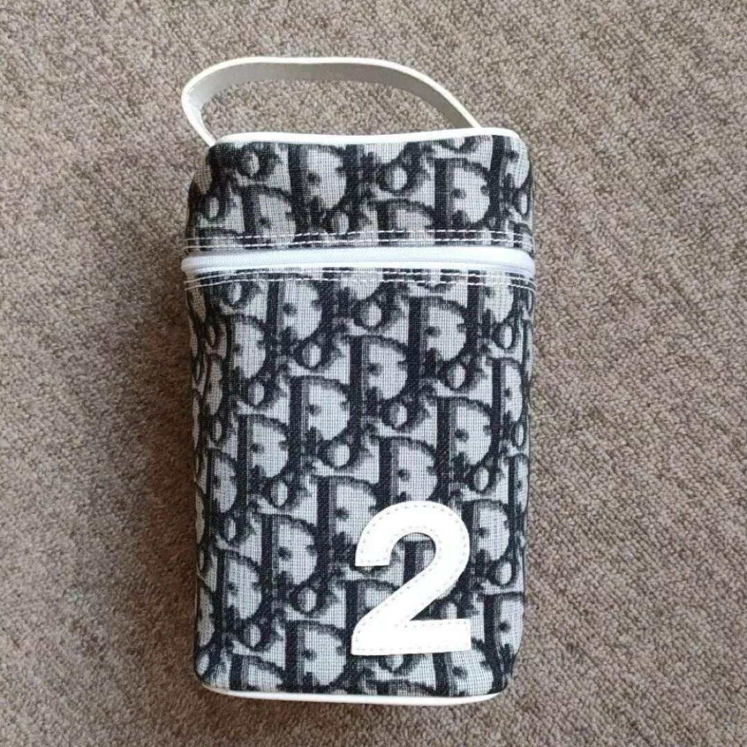 Pochette cosmétique Christian Dior toile vanity noir argent femme mode produits