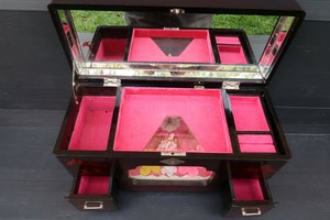 musical jewellery box with dancing doll on it