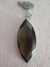 Large Faceted Green Stone Pendant set in silver with 18 inch chain