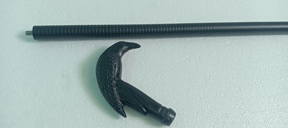 Bastón táctico antiguo de acero inoxidable con mango de cabeza de cuervo de latón negro Foto 3 de 4