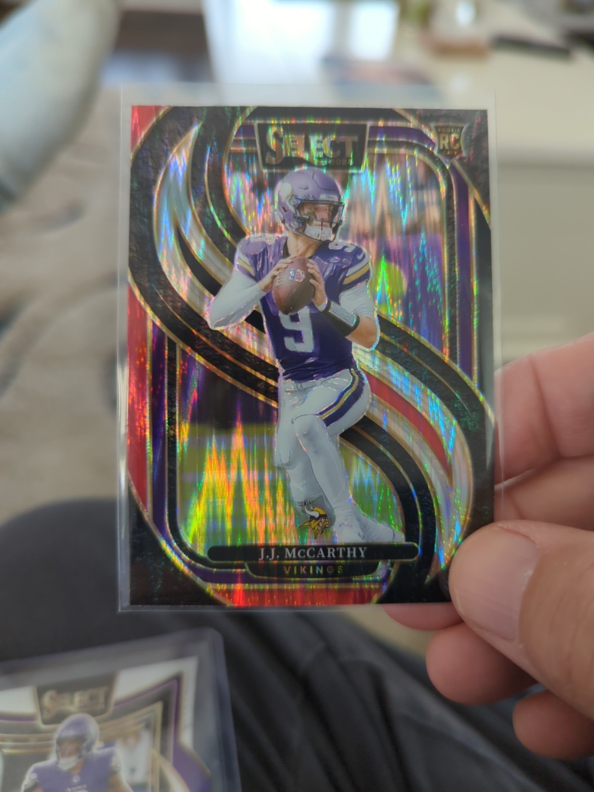 2024 Panini Select Premier Level J.J. McCarthy #134 Black & Red Shock RC Vikings