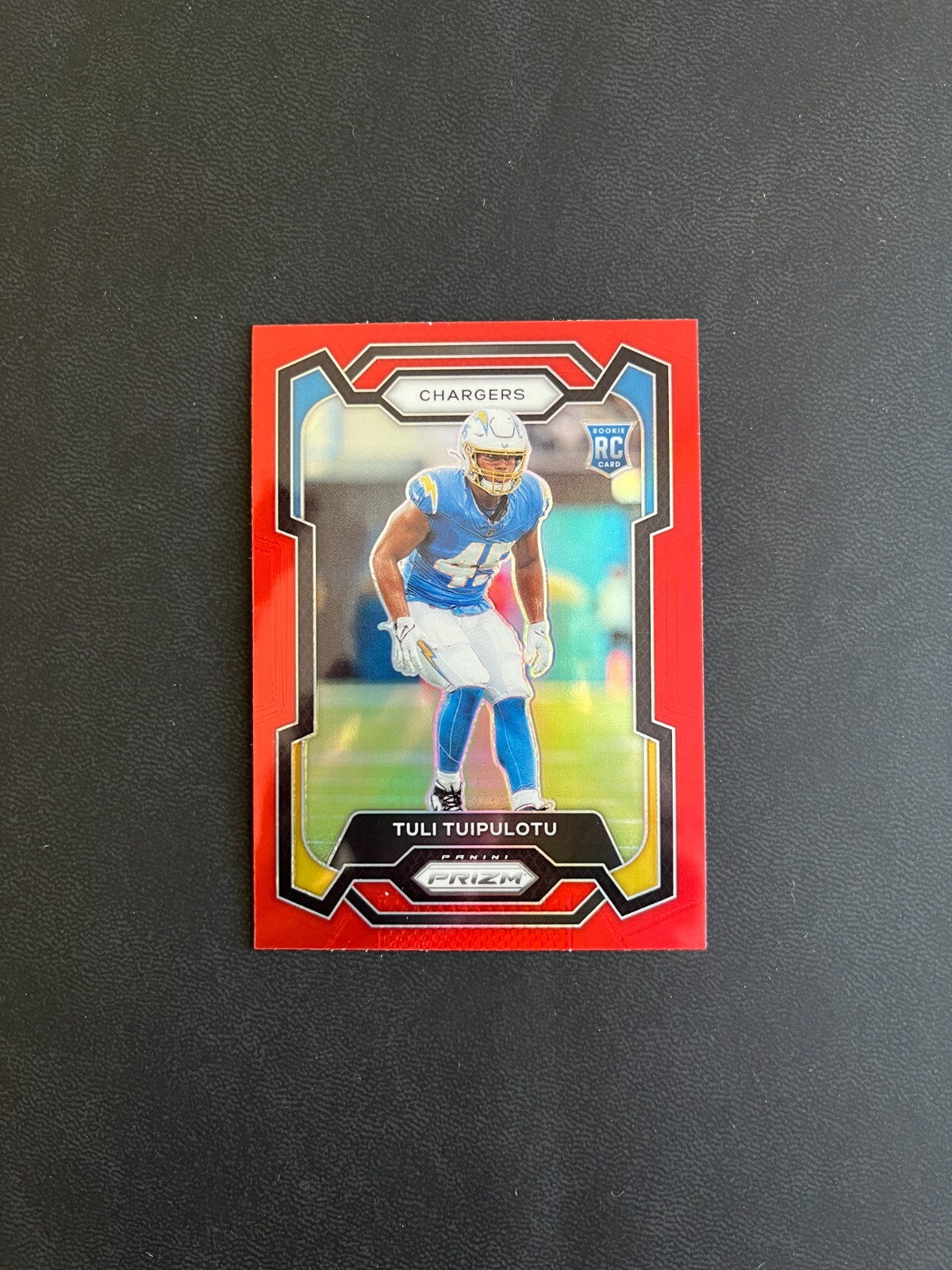 2023 Panini Prizm Football - #354 Tuli Tuipulotu Red Prizm SSP (RC)