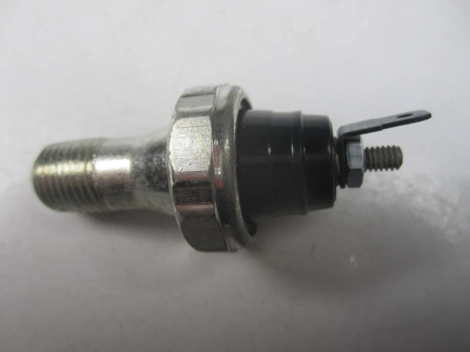 Interruptor transmisor de presión de aceite Ford Lincoln Mercury 67-87 con luz NORS PS18 Foto 2 de 3