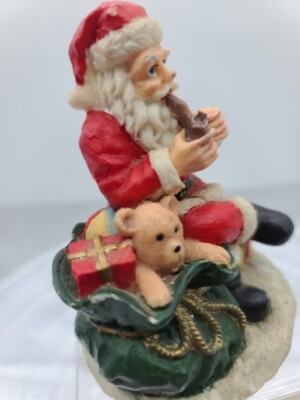 Christmas Decor  Santa Smoking his pipe, Wth Bag Of toys, 1992 Resin Very Cool