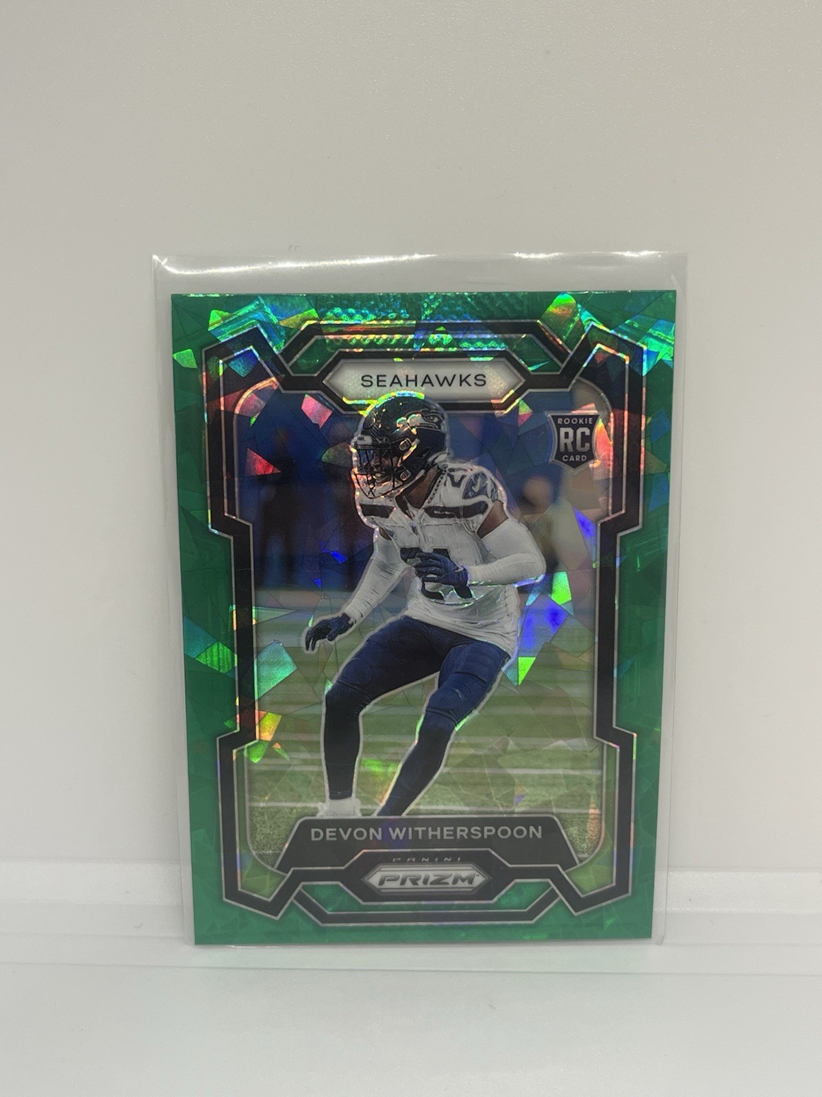 2023 Panini Prizm - #389 Devon Witherspoon Green Ice RC (SP)