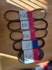 MISC  LOT OF ROTARY BELTS AND OREGON MOWER BLADES FOR MTD MACHINES