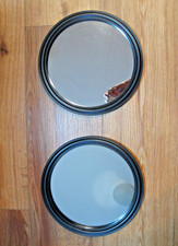 A pair of Round Black Plastic Frame Wall Mirrors each are 9 3/8 inches Diameter