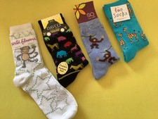 4 PAIRS WOMEN S NOVELTY SOCKS NWL SZ 9-11 GIRAFFE/MONKEY/JUNGLE