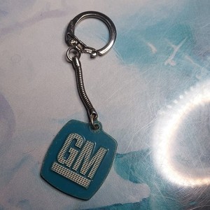 GM Fisher Body Fleetwood 50th ann. June 15, 1967 and Ford 75th anniv. keychains