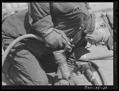 1910s-1940s Soldier Using Drilling Tool Military Maintenance Close Up