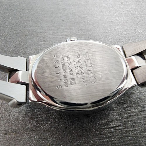 Seiko Watch Women 17mm Black Dial Silver Tone Diamond Accents 1N00-0KG0 New Batt - Picture 10 of 11