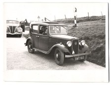 Photography of an Austin Seven passenger car, right-hand drive, with the...