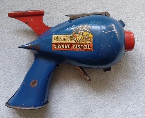 Rare vintage Marx metal toy air raid warning siren-sparkling signal pistol