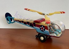 SCHYLLING FRICTION BASED TIN TOY WHIRLY BIRD ...