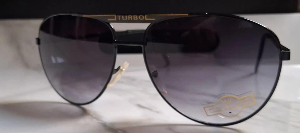 Gafas de sol Turbo Aviator con lente oscura y marco de metal Foto 2 de 4
