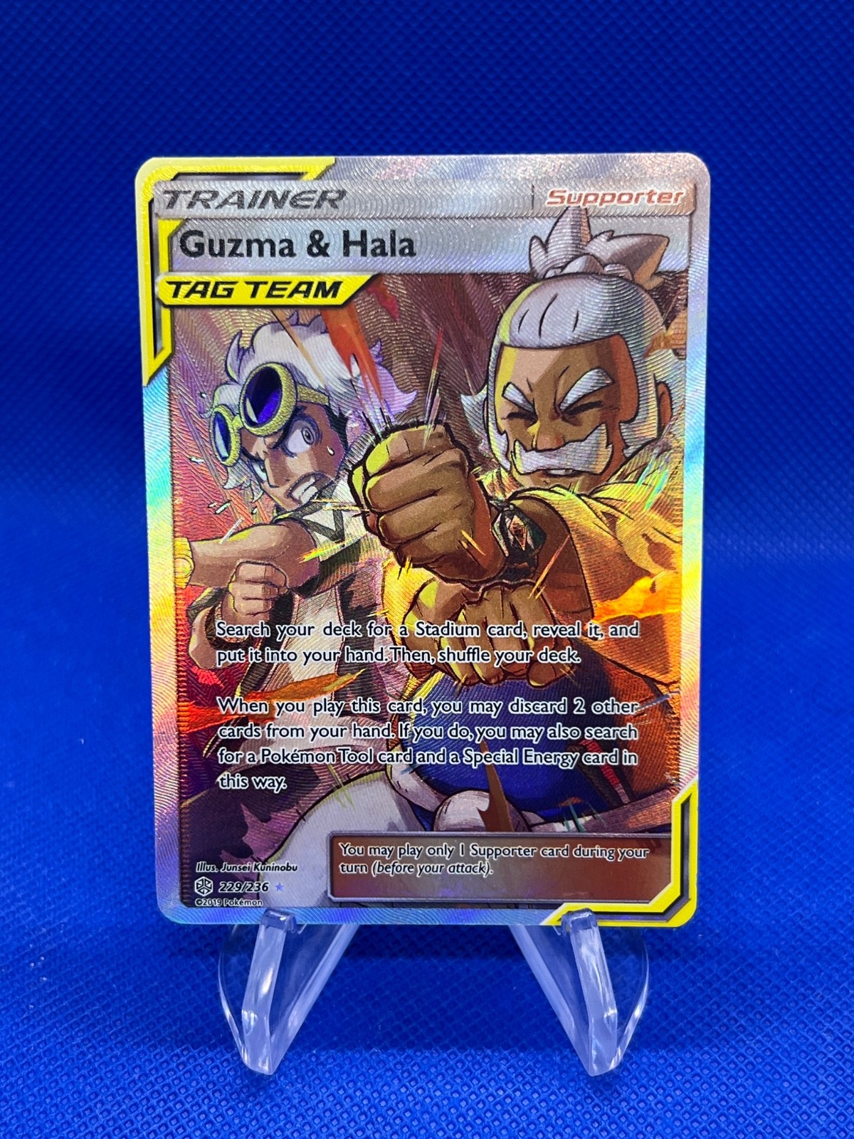 Pokemon Cosmic Eclipse Guzma & Hala Tag Team 229/236 Ultra Rare Full Art NM/LP