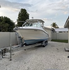 twin 150s. has AC in cabin. great for camping, fishing, etc.