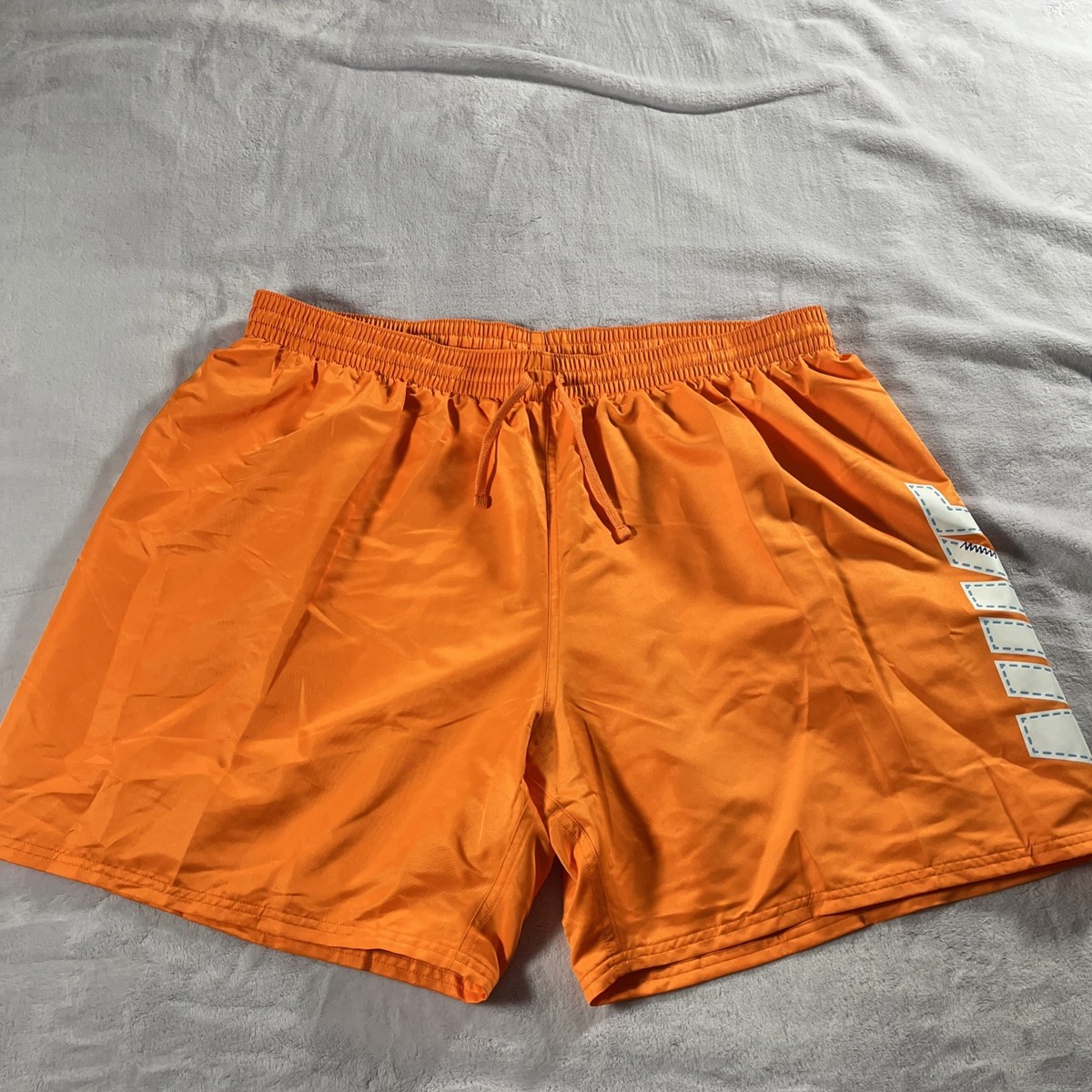 orange nike swim trunks