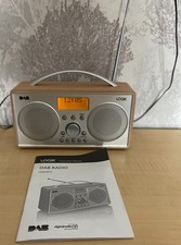 Logik L55DAB15 Portable DAB+/FM Clock Radio - Silver/Wood. With Instruction book