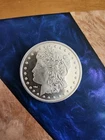 1 Troy Oz. Silver Round Morgan