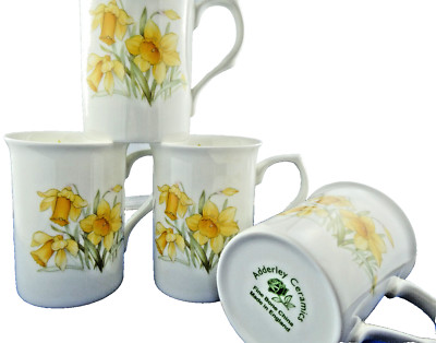 DAFFODIL SET OF FOUR IDENTICAL, FINE BONE CHINA MUGS ENGLISH MADE..NEW