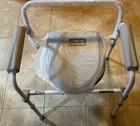 Steel Folding Bedside Commode Chair With 7.5 Qt Bucket 350 lb Weight Capacity — photo 1