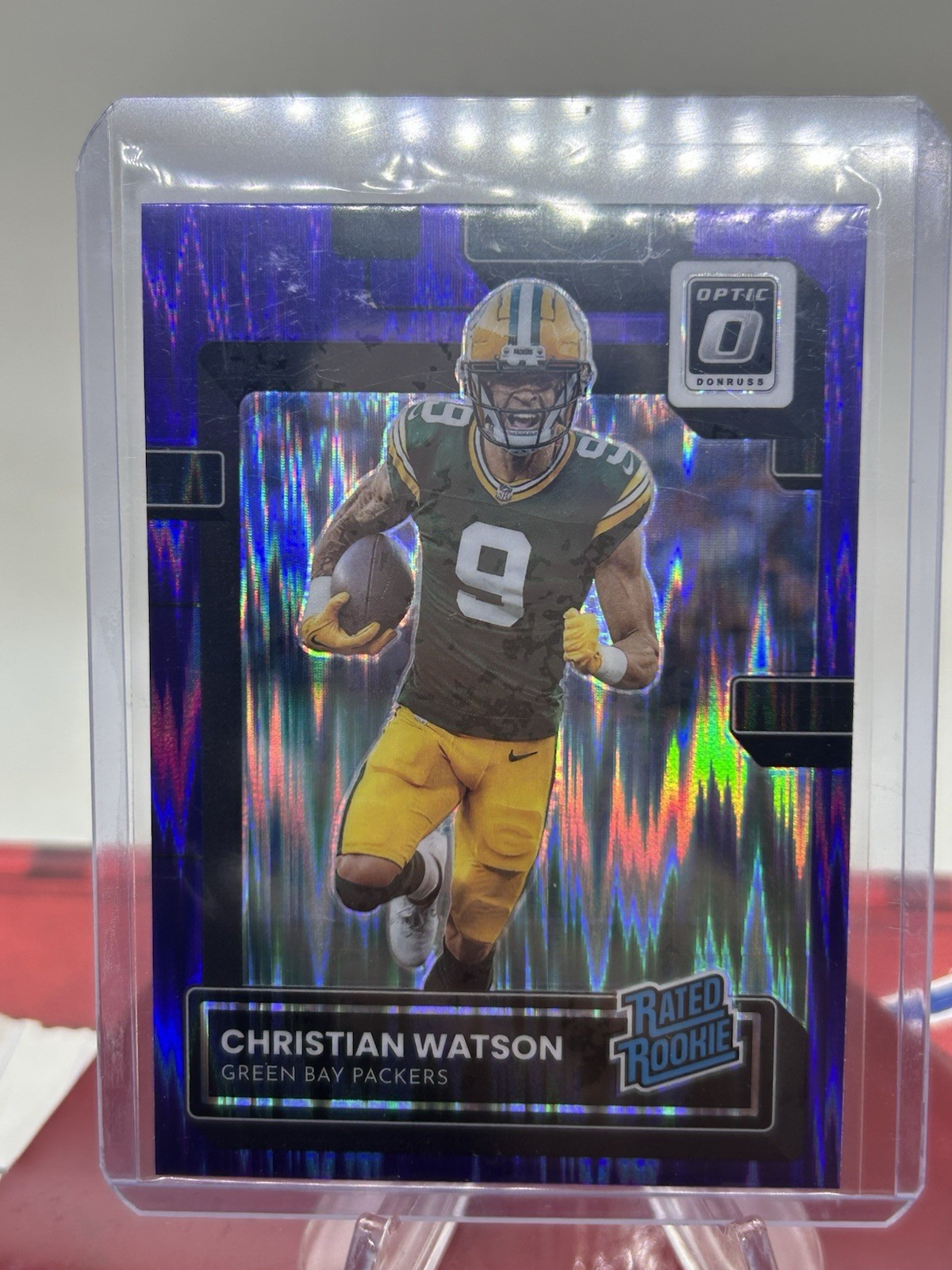 2022 Panini Donruss Optic Rated Rookie Christian Watson #219 Purple Shock Prizm