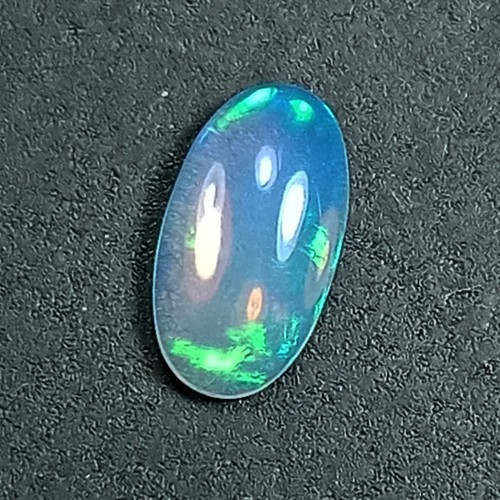 1.18Cts_Eye-catching Multi-Color Oval 100% Natural White Opal Gemstone M247 - Picture 2 of 4