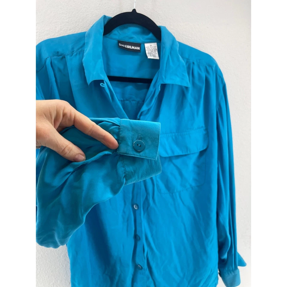 Camisa Diane Gilman Seda Abotonada Azul Manga Larga Bolsillo Mediana Foto 3 de 4