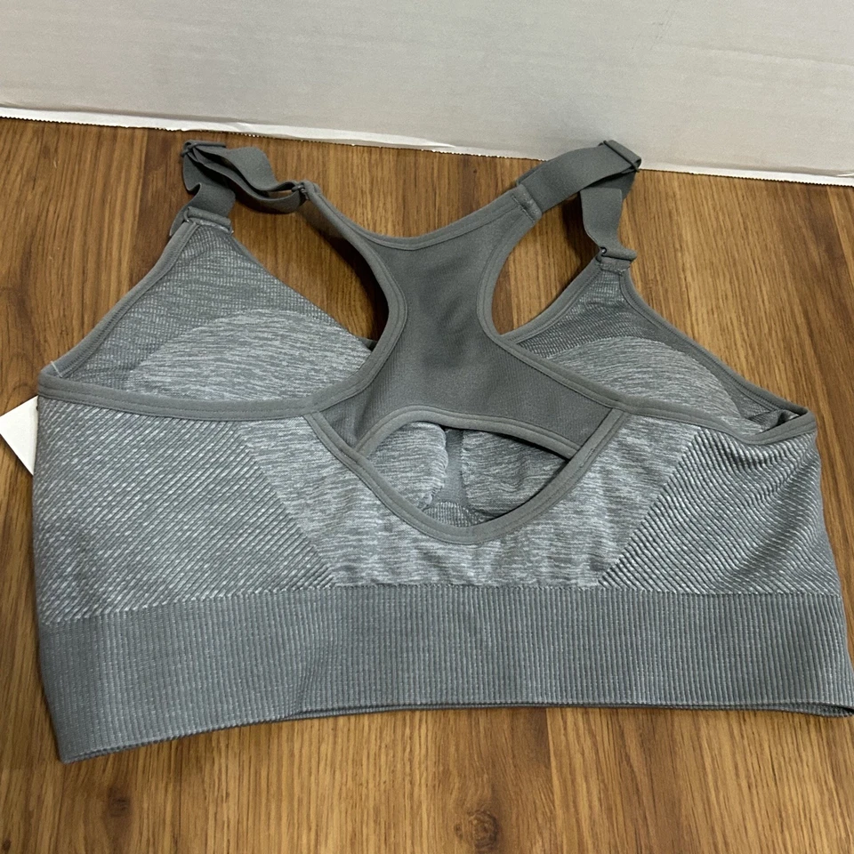 XL | SUJETADOR DEPORTIVO AVIA SOPORTE BAJO OJO DE CERRADURA SIN APARIENCIA - NEGRO Y GRIS Foto 2 de 4