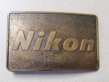 Nikon 1970's Brass Belt Buckle Vintage USA Made 2" X 3.5"